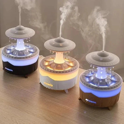 Raindrop Diffuser and Spaceship drop Humidifier in a modern minimalist room, releasing mist with soft ambient lighting.